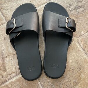 Uggs flip flops ( all leather ) adjust to your feet size